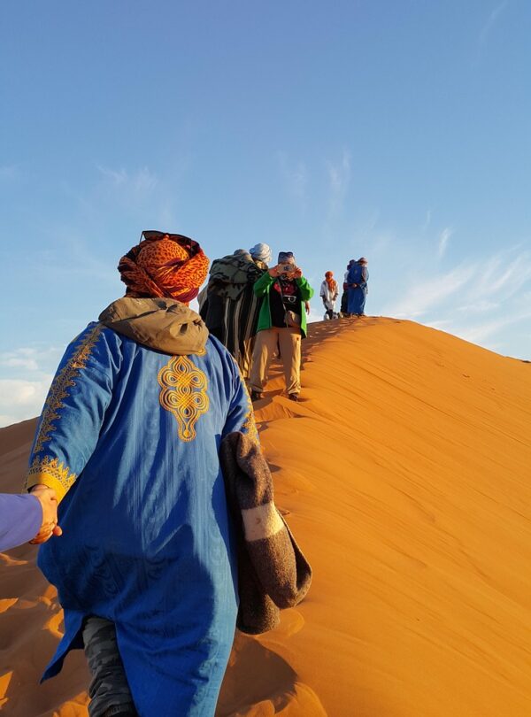 helping hand, golden sands, colorful, humanity, sahara, climb, hold on, together, snapshot, morocco, africa, blue help, blue human, blue together, sahara, morocco, morocco, morocco, morocco, morocco