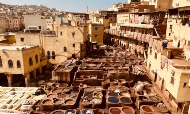 Aerial view of ancient leather tanneries in Fez, showcasing traditional Moroccan craftsmanship.