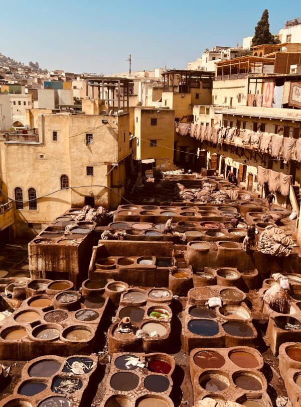 Aerial view of ancient leather tanneries in Fez, showcasing traditional Moroccan craftsmanship.